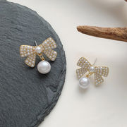気質真珠のイヤリング ちょうネクタイ イヤリング 925イヤリング 韓国のファッションイヤリング