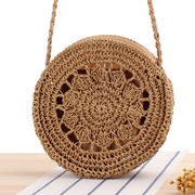 新型の丸型ショルダーバッグ編みバッグins夏のビーチバッグ森系草編みバッグ丸餅女性バッグ