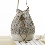 新作透かし彫りバケツ編みバッグショルダービーチバッグ海辺リゾート草編みバッグレディースバッグ
