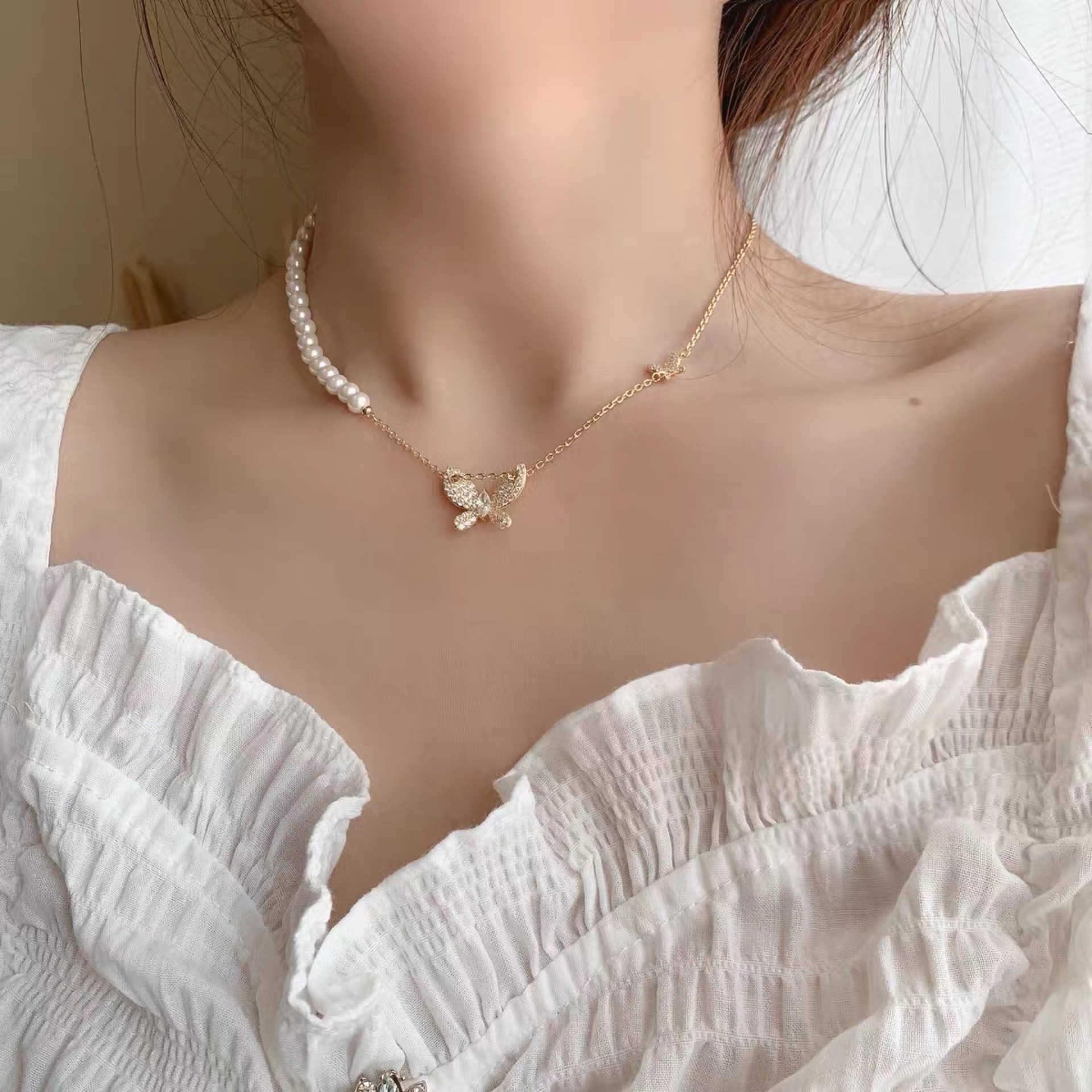 バタフライジルコン鎖骨チェーン 人気 真珠のネックレス 韓国のファッションアクセサリー