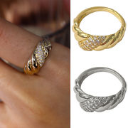 欧米 の新製品 キラキラ アクセサリー かわいい人気のジルコン リング 18K銅メッキ 女性のねじれた指輪