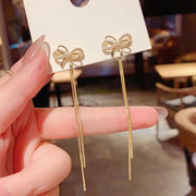 925銀針2つのイヤリング女性の長い真珠のフリンジの蝶ネクタイのイヤリング気質のイヤリングブーム