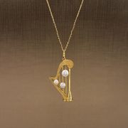 フレンチの個性が優雅でレトロ 淡水真珠のネックレス 音符ハープ鎖骨鎖  贈り物GIFT