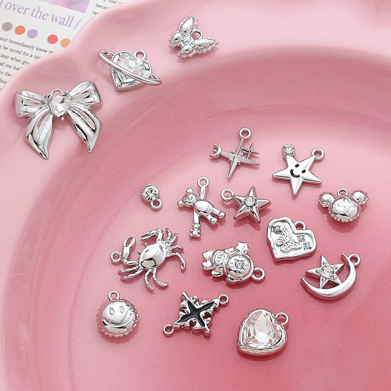 銀 アクセサリーパーツ シルバー ハンドメイド センターパーツ 星チャーム りぼん結び 熊 蟹 ハート 胡蝶