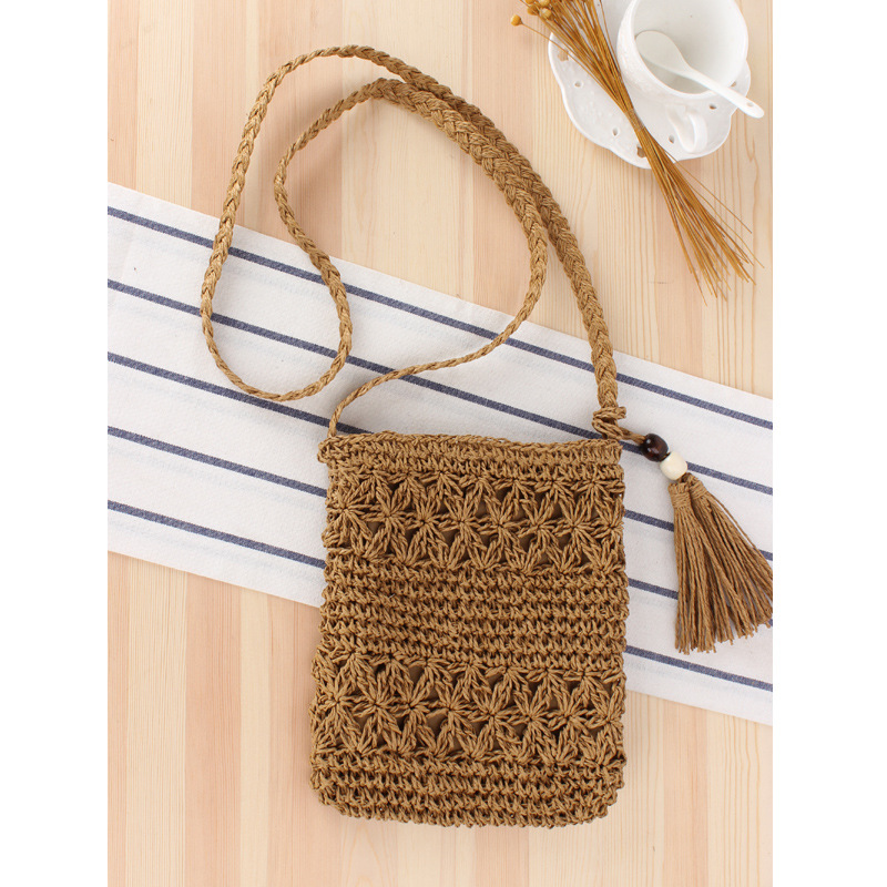 代髪新品シンプル透かしフリンジ斜め掛け草編みバッグ手編みバッグ夏のリゾートビーチバッグ
