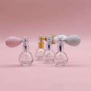 「エアバッグ」香水ボトル、ガラス製ディスペンサーボトル、化粧品プッシュ式スプレーボトル、化粧水ボトル