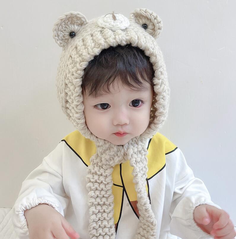 秋と冬の赤ちゃんの帽子かわいいぬいぐるみの帽子厚くされた赤ちゃんの暖かい耳の帽子