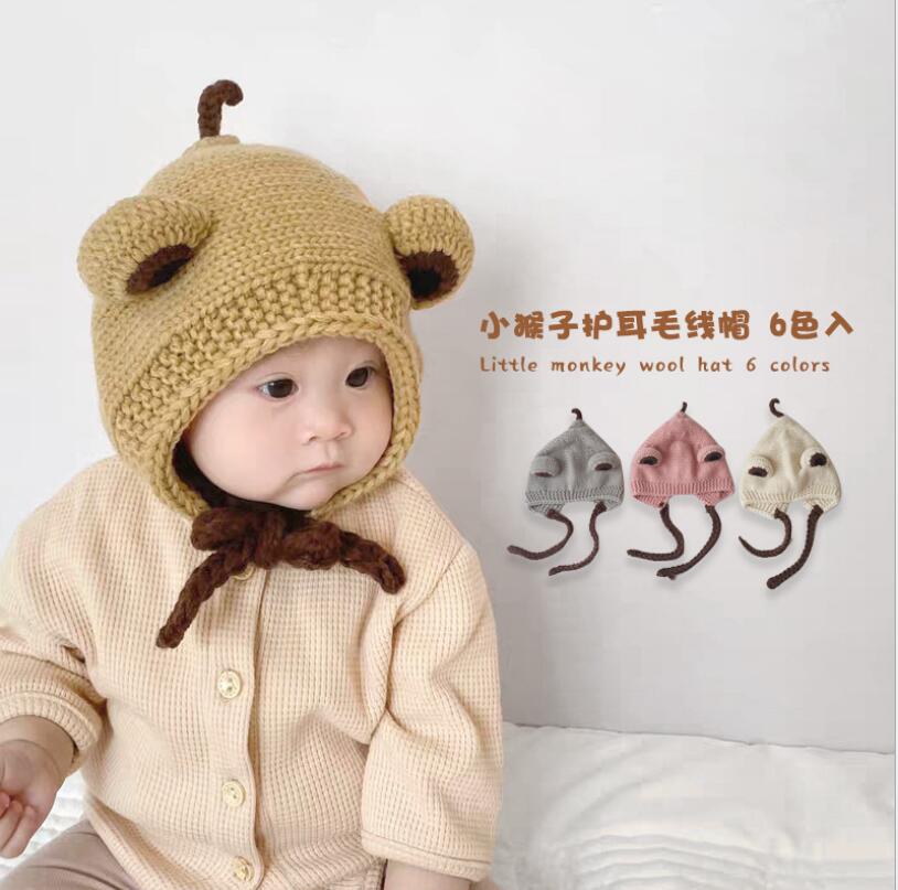 秋と冬の赤ちゃんの帽子かわいいぬいぐるみの帽子厚くされた赤ちゃんの暖かい耳の帽子